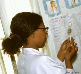 Nurse preparing a polio vaccination near
Alem Kitmama North East of 
Addis-Ababa, Ethiopia, Africa